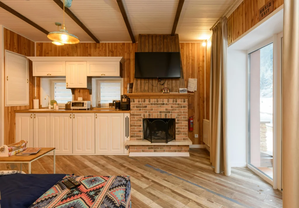 inicio Cocina y Salón Integrado con Chimenea de Ladrillo