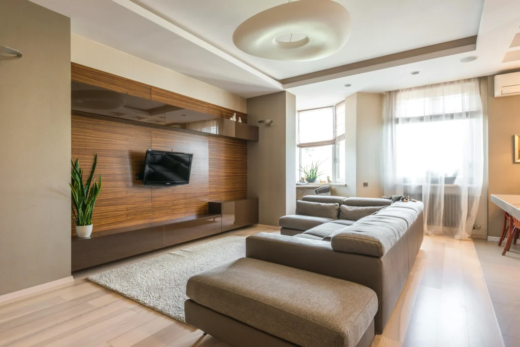 Vivienda Aeronáutica Sala de Estar Moderna con Sofá en L y Panel de Madera
